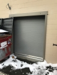 grey roll up commercial overhead / garage door installation