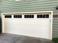 4 panel 4 divided lite double residential garage door installation