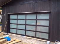 double frosted glass residential garage door installation