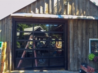 single full glass residential garage door installation