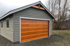 natural wood double garage door installation